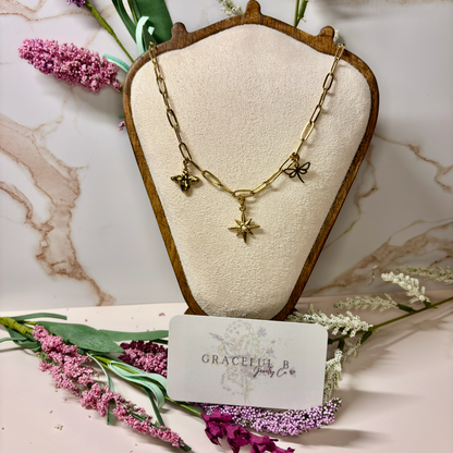 Golden Garden Charm Necklace – 18K PVD Bee, Dragonfly & Starburst Pendant